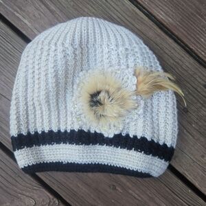 Womens winter crochet winter beanie toboggan hat with fur and feathers